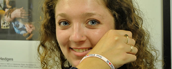 college learner Charlotte Chuck wears her Seville bracelet with pride after her erasmus+ experience