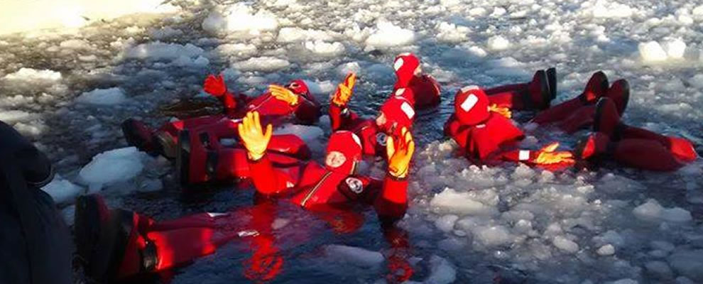 derby college students swim in the frozen waters of Lapland during their Eramsus+ mobility
